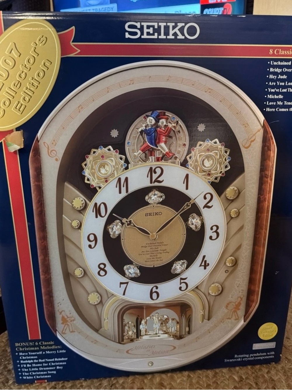 Seiko Gold and White Musical Motion Wall Clock